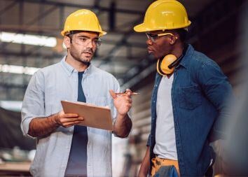 Building-maintenance-colleagues-using-digital-tablet